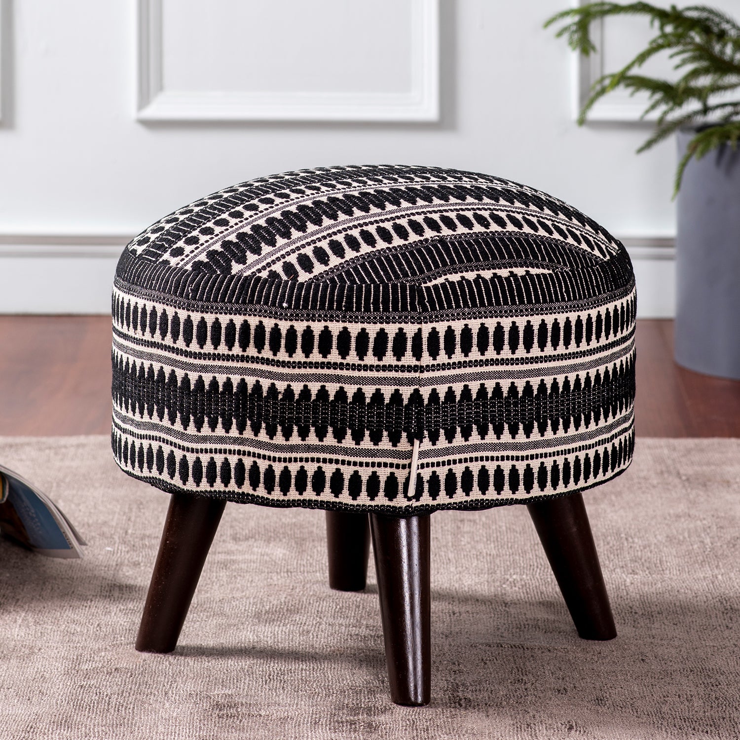 Black and store white ottoman pouf