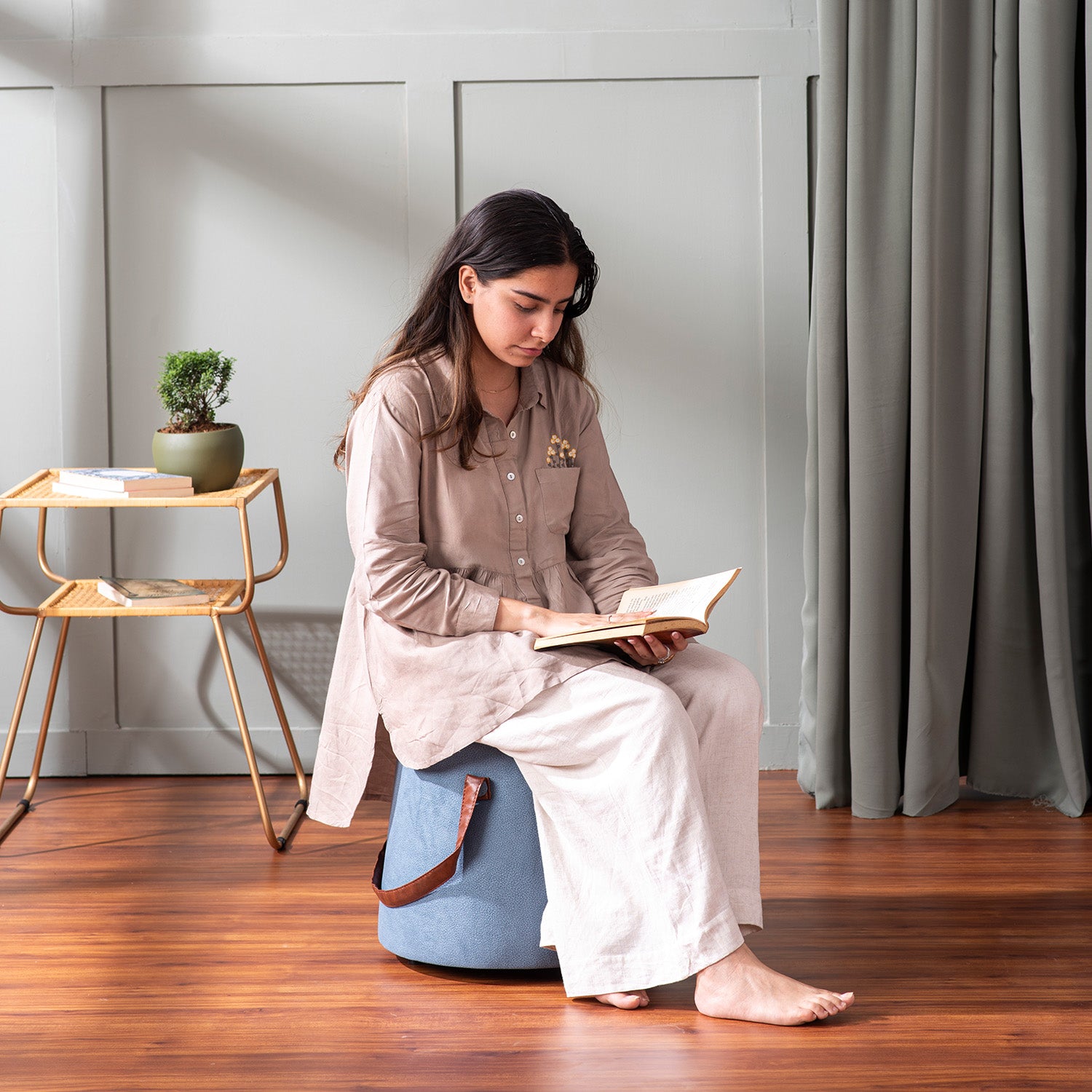 Hoist Collection Blue Pouf With Faux Leather Strap