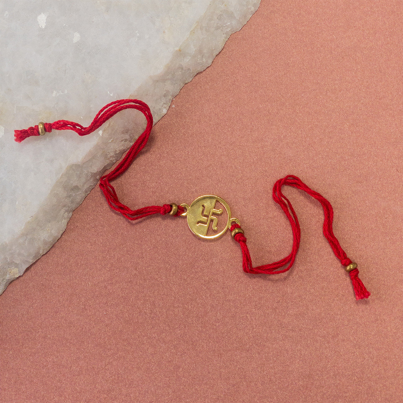 Swastik Rakhi - Red Thread